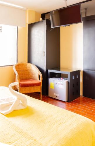 Postel nebo postele na pokoji v ubytování Hostal Antares