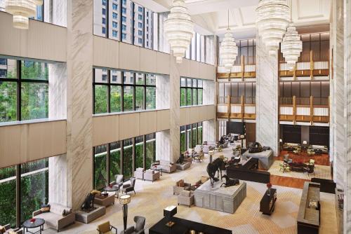 ห้องอาหารหรือที่รับประทานอาหารของ Conrad Tianjin