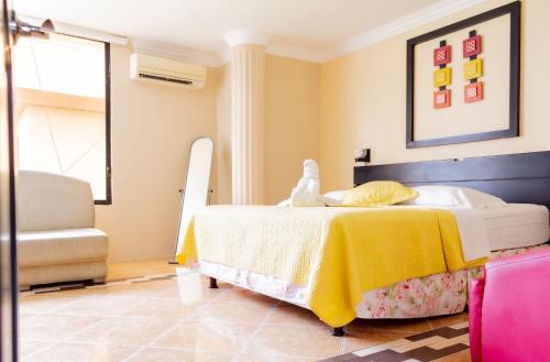 Postel nebo postele na pokoji v ubytování Hostal Antares