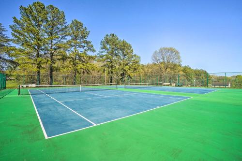 a tennis court with at Charming Hedgesville Retreat with Deck and Fireplace! in Hedgesville