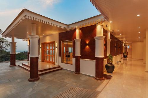 an image of a house with columns at DoubleTree by Hilton Goa - Panaji in Panaji