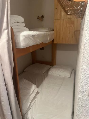 Poschodová posteľ alebo postele v izbe v ubytovaní Samoens 1600 les cimes