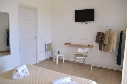 Katil atau katil-katil dalam bilik di Campus Dei - Tropea Rooms