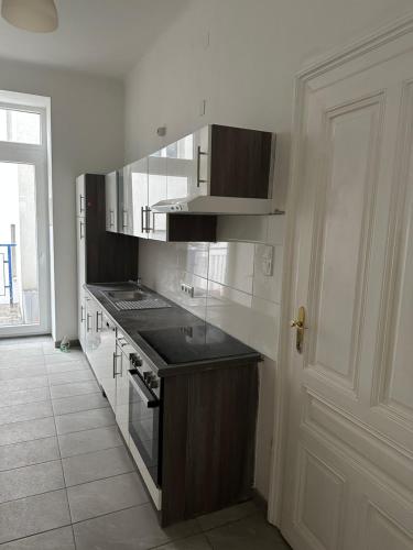 Η κουζίνα ή μικρή κουζίνα στο City Apartment