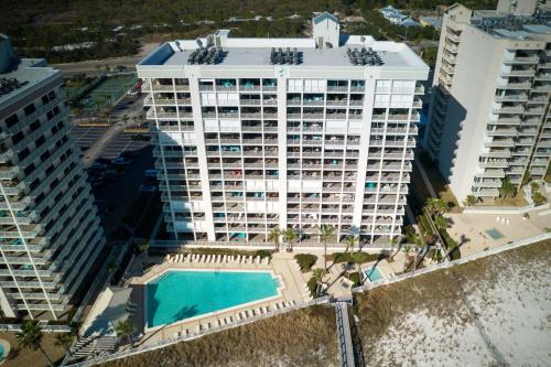 an aerial view of a large building with a pool at Pelican Pointe 1505 by Vacation Homes Collection in Orange Beach