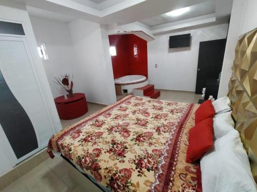 Postel nebo postele na pokoji v ubytování HOTEL EL ENCANTO