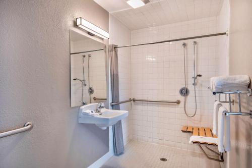 a bathroom with a sink and a shower at Motel 6-Marina, CA - Monterey in Marina
