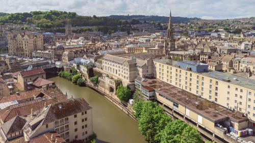 an aerial view of a city with a river at DoubleTree by Hilton Bath in Bath