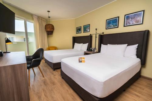 Postel nebo postele na pokoji v ubytování Casa Andina Select Paracas