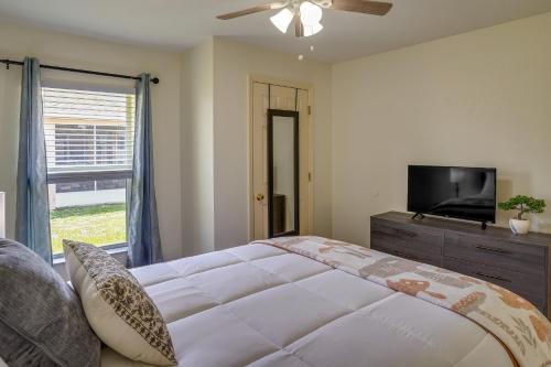 a bedroom with a bed and a flat screen tv at Sebring Vacation Rental Near Boating and Fishing! in Sebring