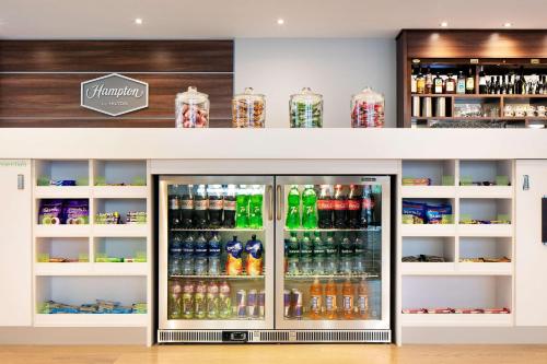 a refrigerator filled with lots of different types of drinks at Hampton by Hilton Dundee City Centre in Dundee