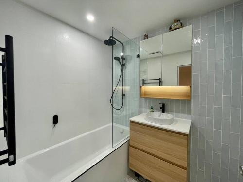 a bathroom with a sink and a shower at DRUM8- 3 Bed townhouse Drummoyne in Sydney