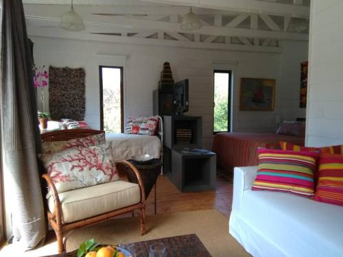 Ruang duduk di Cabaña Loft Campo y Mar Rocas de Santo Domingo