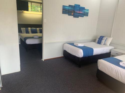 Postel nebo postele na pokoji v ubytování Arkana Motel