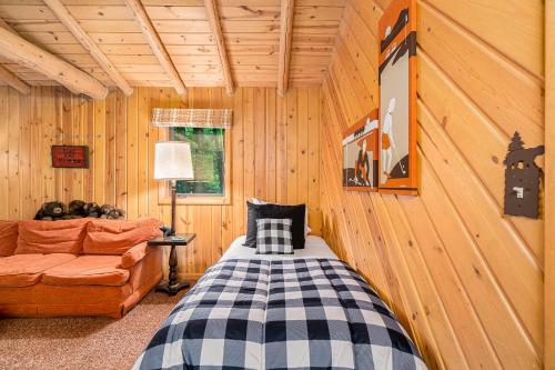 Ένα ή περισσότερα κρεβάτια σε δωμάτιο στο The Log Cabin