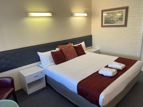 Postel nebo postele na pokoji v ubytování Arkana Motel