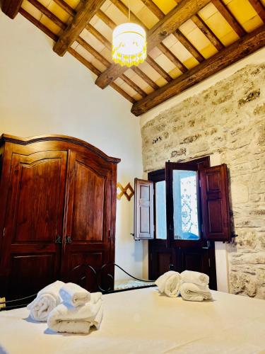 Una cama o camas en una habitación de da Ninetta