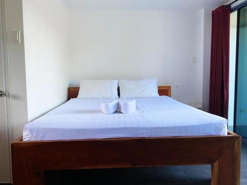 Ένα ή περισσότερα κρεβάτια σε δωμάτιο στο Malipaj Apartments