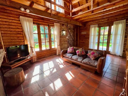 Μια τηλεόραση ή/και κέντρο ψυχαγωγίας στο Casa Estilo Cabaña, Bosque Peralta Ramos