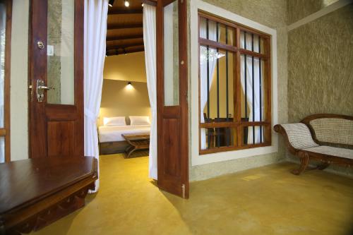 Postel nebo postele na pokoji v ubytování Cloud Nine Lanka Resort Wilpattu