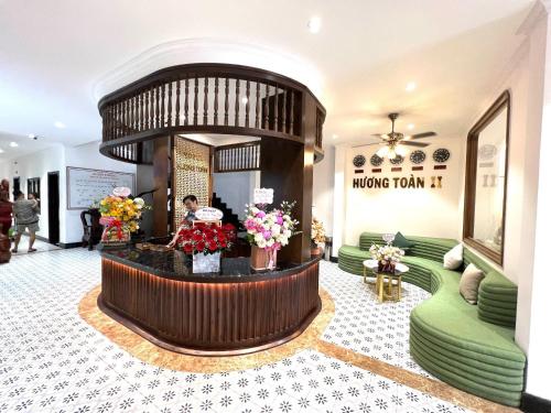 a lobby with a flower shop with flowers in it at Hương Toàn 2 Hotel in Phu Quoc