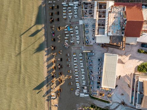 an overhead view of a parking lot with cars at Horizon Apartments - Beachfront Luxury, by ZanteWize in Laganas
