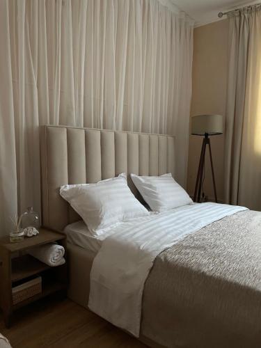 Кровать или кровати в номере Уютный коттедж с Баней со сруба на дровах