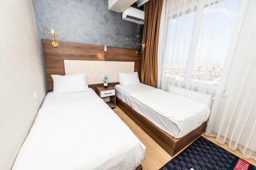 Postel nebo postele na pokoji v ubytování Blue Vista Houses & Spa