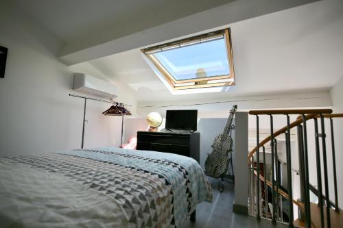 Postel nebo postele na pokoji v ubytování Duplex vue mer plage de Saint-Clair