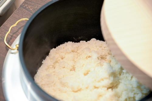 a pot of rice sitting on top of a plate at Kagoshima Plaza Hotel Tenmonkan in Kagoshima