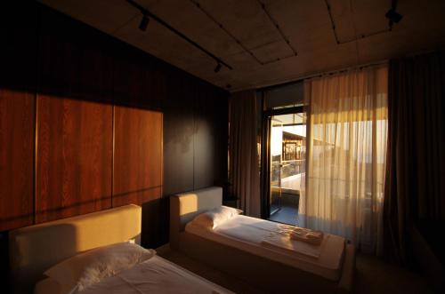 Krevet ili kreveti u jedinici u objektu Hotel Nobilis Hall