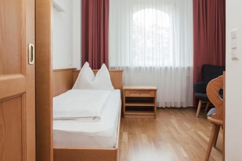 Katil atau katil-katil dalam bilik di Gästehaus Salvatorianerinnen