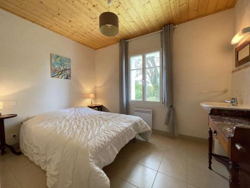 Un ou plusieurs lits dans un hébergement de l'établissement Maison indépendante avec terrasse, proche plage et terrain de 1100 m², Noirmoutier-en-l'Île - FR-1-224B-108