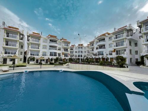 Bazén v ubytování Sharm Hills Aqua park Resort شرم هيلز اكوا بارك ريزورت nebo v jeho okolí