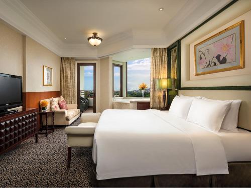 Ένα ή περισσότερα κρεβάτια σε δωμάτιο στο Seaview Resort Xiamen