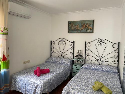 Voodi või voodid majutusasutuse Turismo Vacacional de Lujo ttluga -Málaga toas