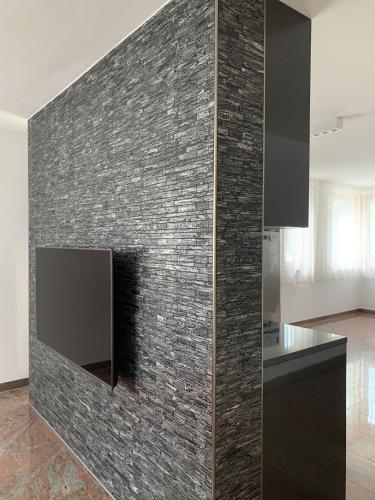 Μια τηλεόραση ή/και κέντρο ψυχαγωγίας στο Mosaikhaus Smart Home