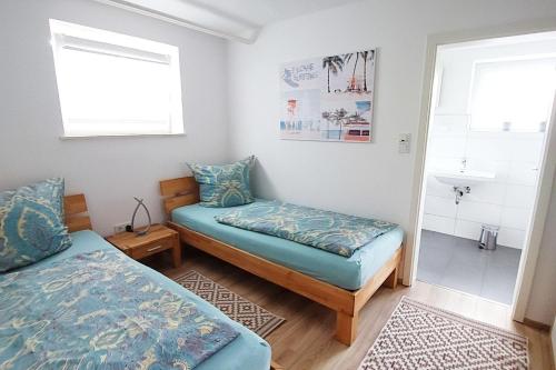 Tempat tidur dalam kamar di Apartment Meerbusch