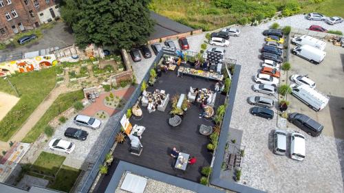 an aerial view of a parking lot with cars parked at Seven Hotel Bytom - Katowice in Bytom