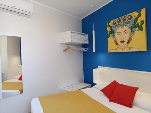 Ένα ή περισσότερα κρεβάτια σε δωμάτιο στο Casa Mylai