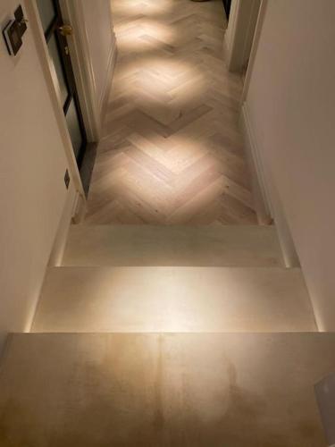 an overhead view of an empty hallway with wood floors at Luxury Georgian Apartment - 5 Minute Walk to Spa in Bath