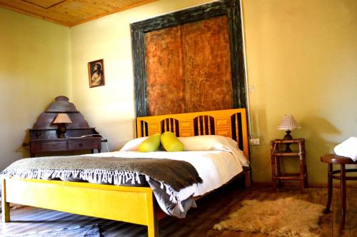 Ένα ή περισσότερα κρεβάτια σε δωμάτιο στο Casona Re-encuentro