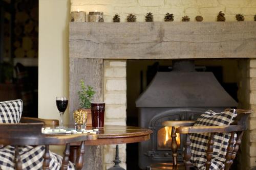 Ein Sitzbereich in der Unterkunft The Hare & Hounds Hotel