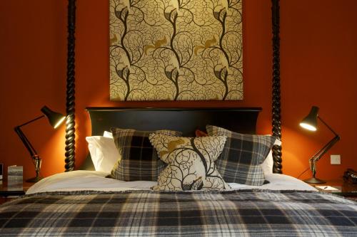 Ein Bett oder Betten in einem Zimmer der Unterkunft The Hare & Hounds Hotel
