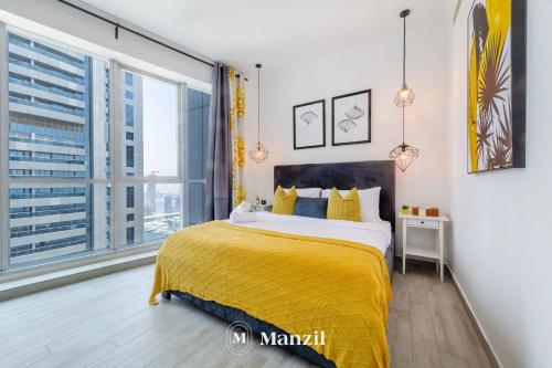 Postel nebo postele na pokoji v ubytování Manzil - Stunning 2BR Apartment in Dubai Marina