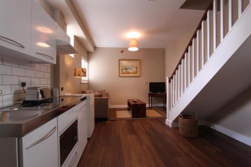 Dapur atau dapur kecil di Woodstock Suites
