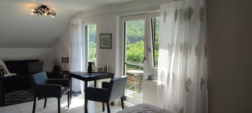 Гостиная зона в Gästezimmer Waldblick Leinsweiler
