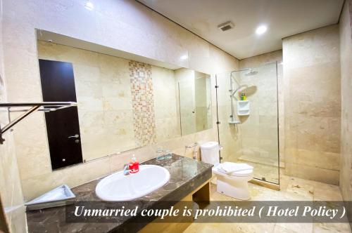 Koupelna v ubytování Hotel Gren Alia Jakarta
