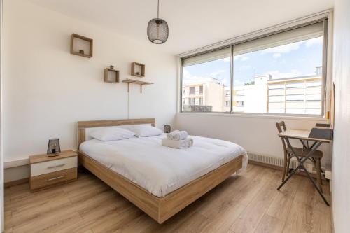 Ένα ή περισσότερα κρεβάτια σε δωμάτιο στο L'Echappée