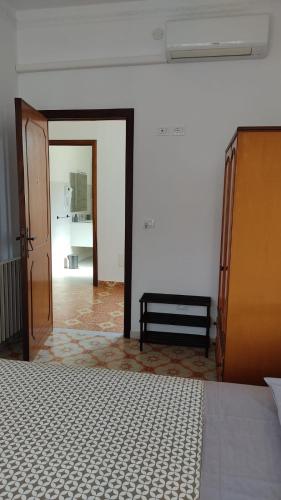 Letto o letti in una camera di La Stazione